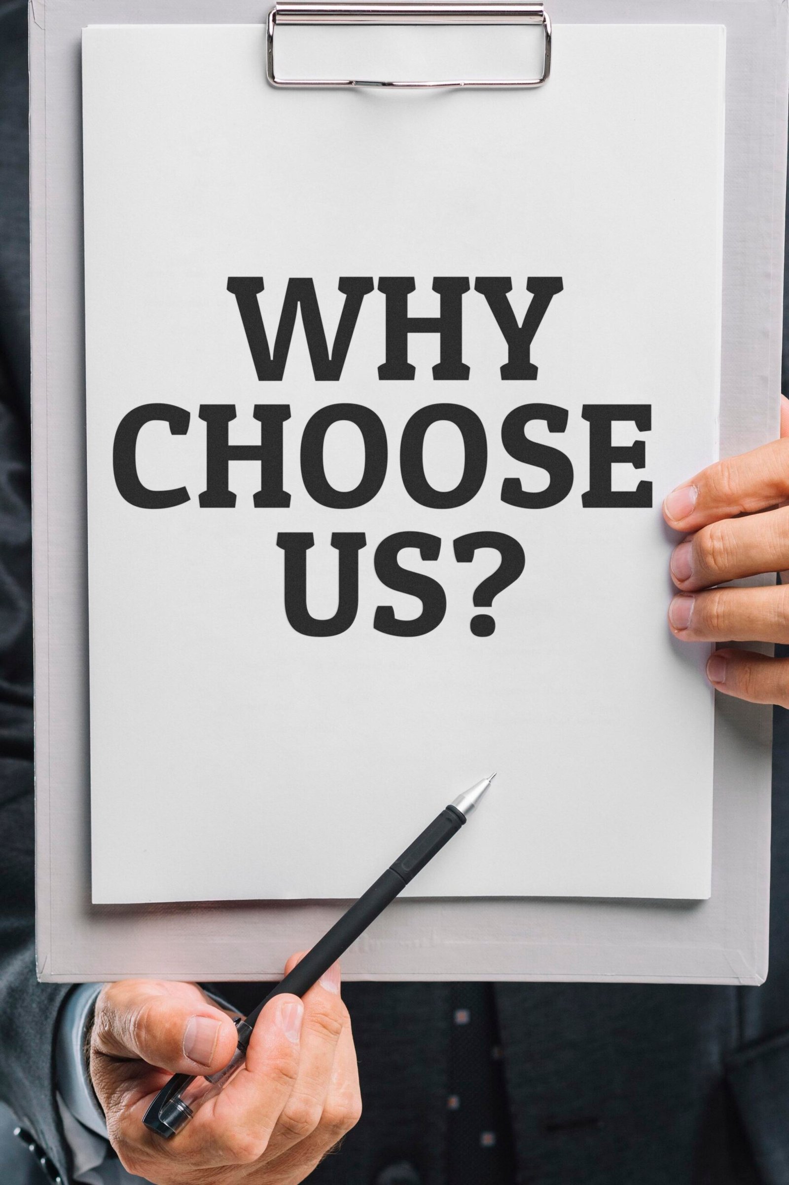 business man holding clipboard with why choose us question business man holding clipboard with why choose us question